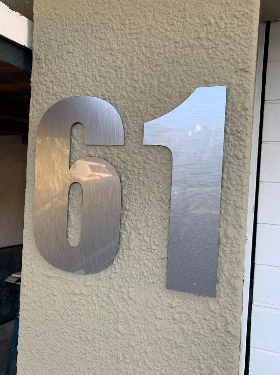Outside Numbers and Logo. Height 30cm